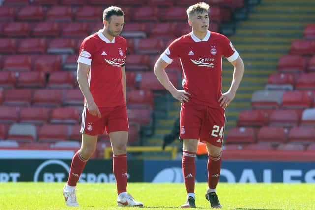 Aberdeen's Andy Considine, left, and Dean Campbell are dejected during the Scottish Cup match against Dundee United.