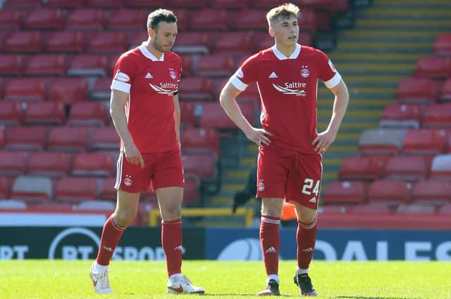 Aberdeen's Andy Considine, left, and Dean Campbell are dejected during the Scottish Cup match against Dundee United.