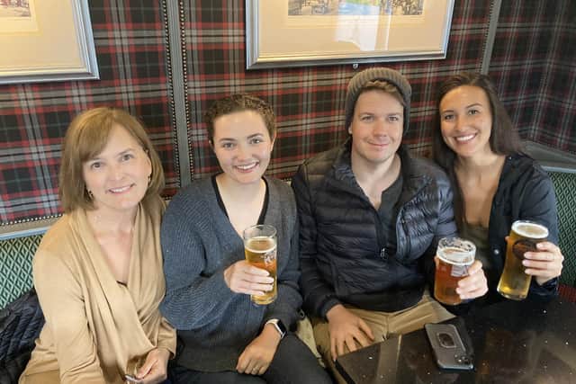 Debbie Meyers, 61, from South California with her daughter Katie Carter, 27, future son-in-law Jason Stilgebouer, 26, and niece Rachel Montemayor, 29, in the Balmoral Bar, Ballater, to watch the funeral of Elizabeth II.