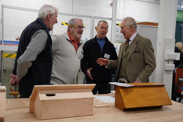 Members of the Aboyne and Mid Deeside Community Shed meet King Charles.