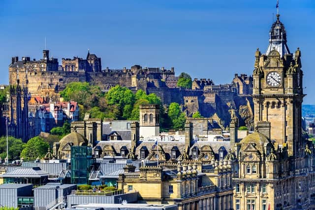 Edinburgh Castle as it sits on the rock above the city and the Balmoral Clock in the foreground. Labour have vowed to work harder on investment in Scotland if they win the general election