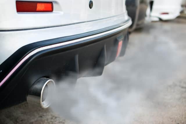 air pollution car exhaust vehicle gasses traffic jam gv