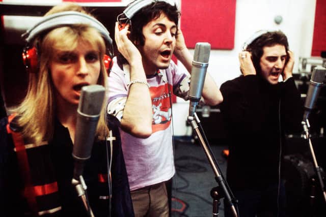 Recording with fellow Wings members Linda and Paul McCartney in London in 1973 (Picture: Michael Putland/Getty)