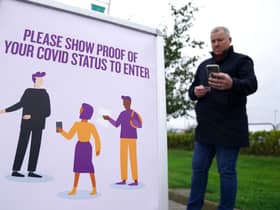 Jason Leitch has said the vaccine passport scheme should be reviewed in the light of the Omicron variant.