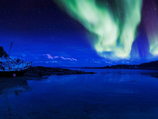 The Aurora Borealis, or Northern Lights, is a wonder which can be seen in certain places across Scotland. You're more likely to see the "Mirrie Dancers" the further north you go, so best bets are places like Shetland and Orkney, Aberdeenshire, the Outer Hebrides, Cairngorms, and Inverness.