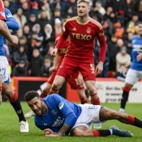 Rangers defender Connor Goldson goes down in the Aberdeen box after having his shirt pulled before he is awarded a penalty following a VAR check. (Photo by Craig Williamson / SNS Group)