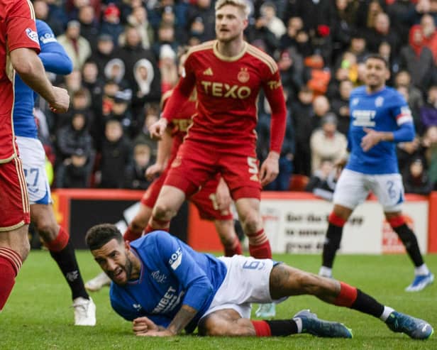 Rangers defender Connor Goldson goes down in the Aberdeen box after having his shirt pulled before he is awarded a penalty following a VAR check. (Photo by Craig Williamson / SNS Group)