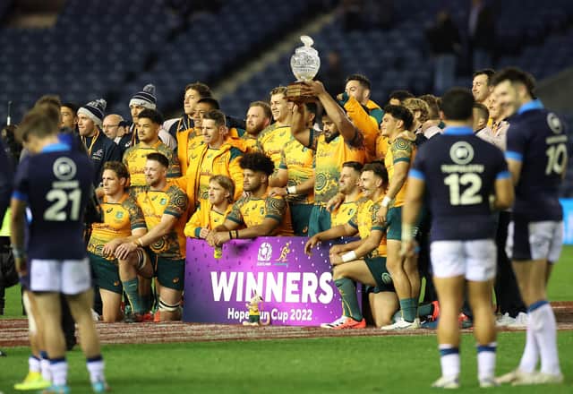 Taniela Tupou of Australia lifts the Hopetoun Cup during the Autumn International match between Scotland and Australia at Murrayfield.