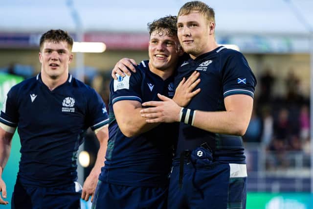Scotland's Tom Currie, left, Geordie Gwynn, centre, and captain Liam McConnell celebrate at full time after beating USA 48-10 in the final of the World Rugby U20 Trophy at Hive Stadium, in Edinburgh. (Photo: Ross Parker / SNS Group / World Rugby)