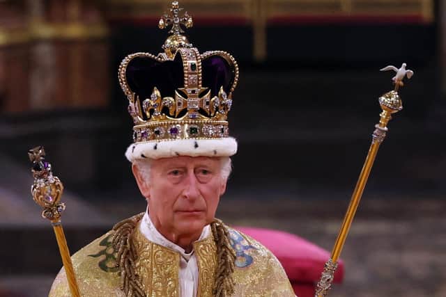 King Charles III walks wearing St Edward's Crown during the Coronation Ceremony inside Westminster Abbey in central London. Picture: Richard Pohle/POOL/AFP via Getty Images