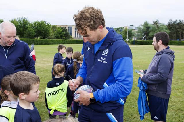 Scotland captain Jamie Ritchie signs autographs during a Papa John's Tartan Touch event at Madras Rugby Club. (Photo by Mark Scates / SNS Group)