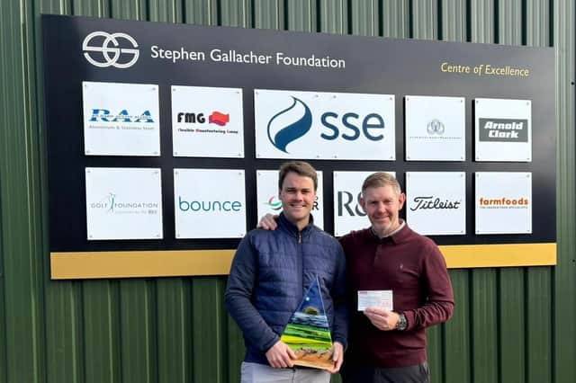 Jamie Kennedy pictured handing over his £10,000 cheque to Stephen Gallacher at Kingsfield Golf Centre near Linlithgow.