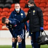Scotland's Glenn Middleton pulls up with an injury during the Under 21 European Championship qualifier against Belgium.  (Photo by Ross Parker / SNS Group)