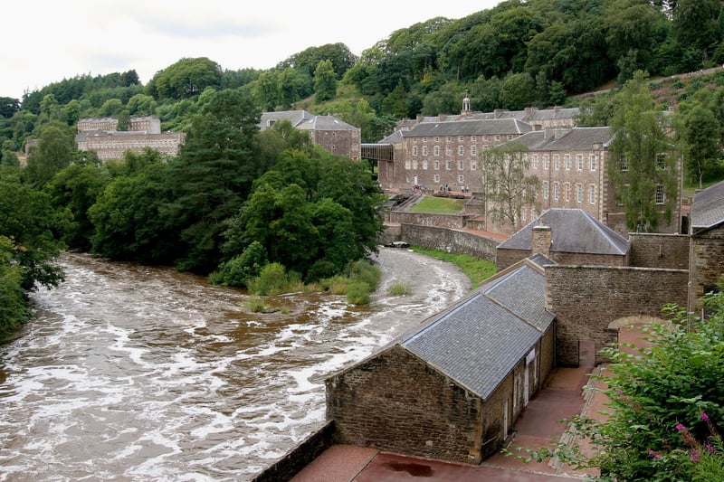New Lanark Mill became a UNESCO World Heritage site in 2001. It is a unique 18th-century cotton mill which is powered by water wheels; it operated between 1786 and 1968. Founded in 1785 by David Dale, it represents over 200 years of social history as the mill, located on the River Clyde where it could take advantage of the water supply, housed many generations of mill workers and it was considered one of the largest industrial groups in the world during the 19th century. Unlike many other businesses, the mill owners offered good living conditions to their workers and thus the heritage site enshrines their humanism.