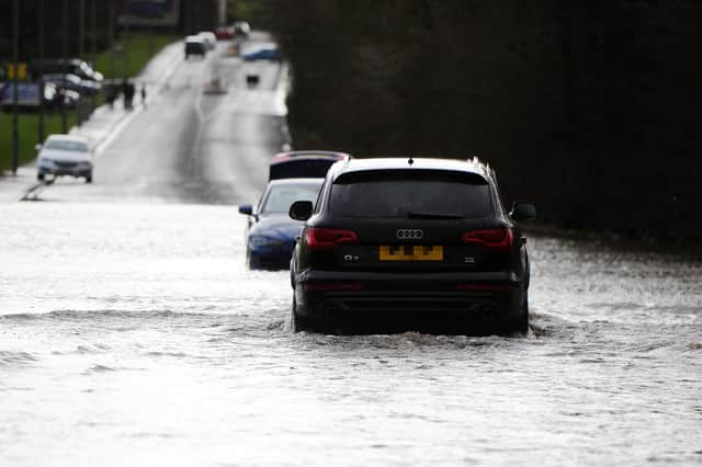 Drivers are facing difficult conditions as water levels rise on the roads.