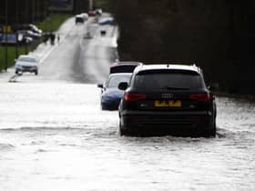 Drivers are facing difficult conditions as water levels rise on the roads.