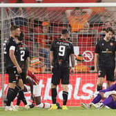 AZ Alkmaar ripped through a dejected Dundee United outfit.