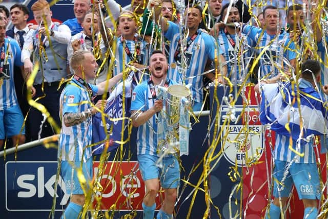 Stokes, then of Coventry City, celebrates with the trophy after the Sky Bet League Two Play Off Final between Coventry City and Exeter City at Wembley on May 28, 2018. (Photo by Catherine Ivill/Getty Images)