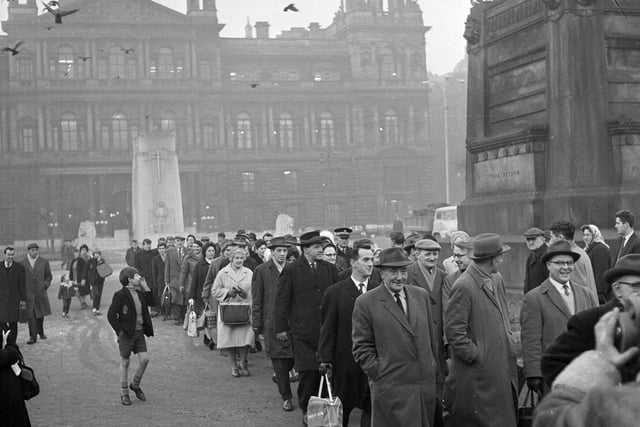 Scottish Legal Life Assurance Society agents march to their offices in Glasgow during an unofficial strike in January 1964.