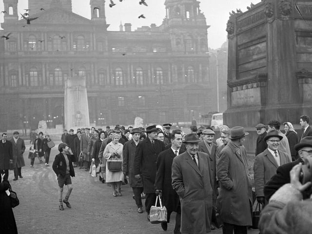 Scottish Legal Life Assurance Society agents march to their offices in Glasgow during an unofficial strike in January 1964.