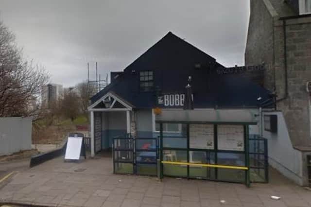 An outbreak has been linked to the popular student pub