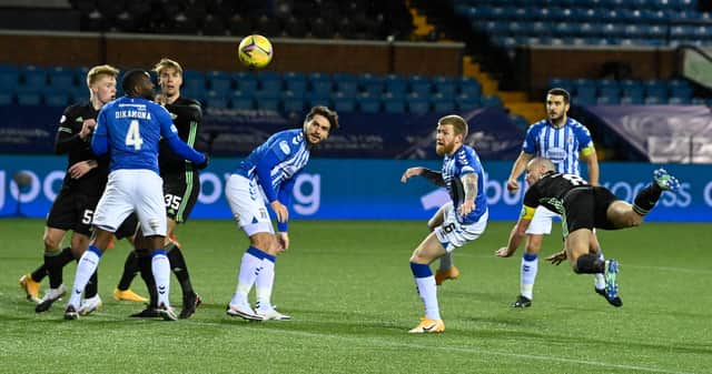 Scott Brown opens the scoring  for Celtic with a tidy header in their 4-0 victory in Kilmarnock. (Photo by Rob Casey / SNS Group)