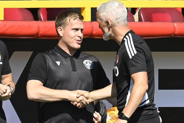 New Motherwell manager Steve Hammell with Aberdeen boss Jim Goodwin. (Photo by Rob Casey / SNS Group)