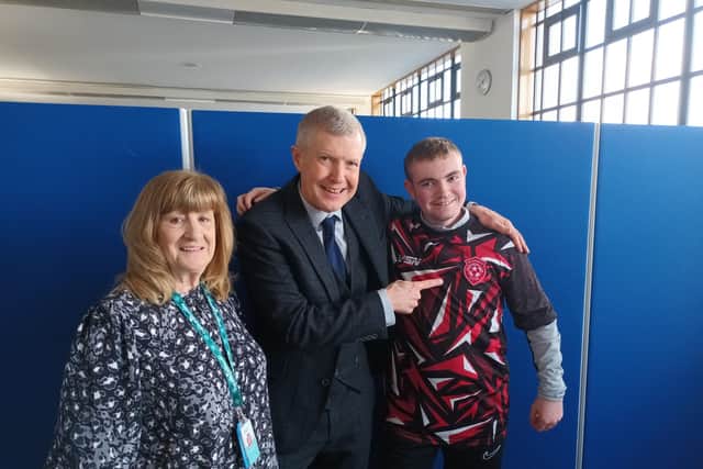 L-R Liz McConnachie, Willie Rennie and student Che Pringle