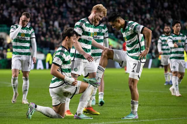 Celtic's Oh Hyeon-gyu celebrates with Luis Palma as he scores to make it 5-0 against Aberdeen.