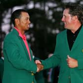 Tiger Woods congratulates Phil Mickelson after winning the 2006 Masters at Augusta National Golf Club. Picture: Andrew Redington/Getty Images.