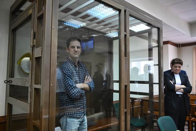 US journalist Evan Gershkovich, arrested on espionage charges, stands inside a defendants' cage before a hearing to consider an appeal on his arrest at the Moscow City Court earlier this week. Picture: AFP via Getty Images