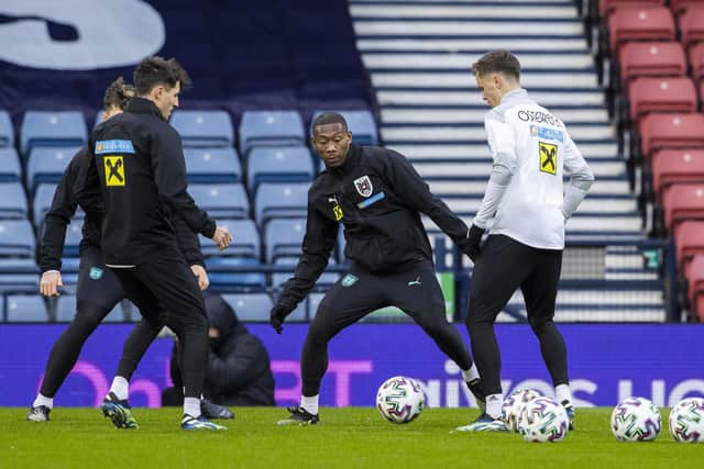 David Alaba (centre) during an Austria training session at Hampden Park, on March 24, 2021, in Glasgow, Scotland (Photo by Alan Harvey / SNS Group)