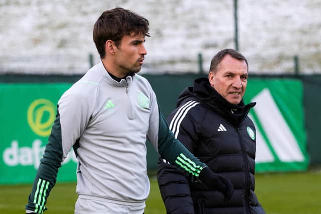 Celtic manager Brendan Rodgers and Matt O'Riley during a Celtic training session at Lennoxtown on Friday.