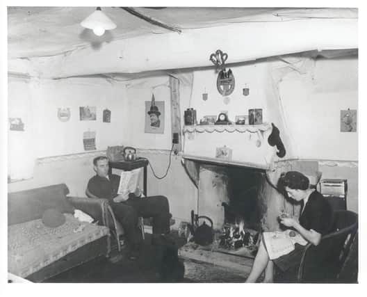 Electricity comes to this Plockton in the mid-1950s. THe electric ketlle is plugged into the wall - but the trusty copper version sits on the hearth. PIC: Bill Ramsay Collection/Skye and Lochalsh Archive Centre/Am Baile