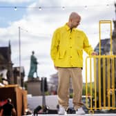 Artist Kostya Benkovich presents his sculpture The Suitcase at the Assembly Gardens in Edinburgh