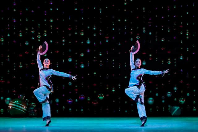 Scottish Ballet dancers Alice Kawalek and Kayla-Maree Tarantolo worked with traditional Chinese fan artist Annie Auare before appearing in The Nutcracker. Picture: Andy Ross