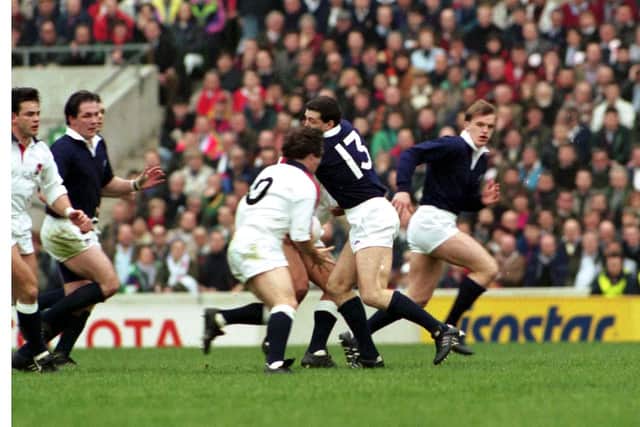 Gregor Townsend, right, earns his first cap after coming on for the injured Craig Chalmers against England at Twickenham in March 1993. Picture: Adam Elder