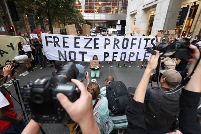 Protesters outside the Ofgem HQ in Canary Wharf, London, last week after the regulator confirmed an 80.06 per cent rise in the energy price cap, sending the average household's yearly bill from £1,971 to £3,549 from October. Photo: James Manning/PA Wire