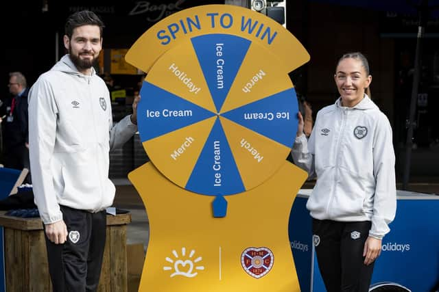 Craig Gordon and Georgia Hunter are pictured as Hearts unveil loveholidays as their official holiday parter at Waverley Station.  (Photo by Mark Scates / SNS Group)