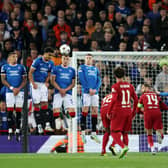 Trent Alexander-Arnold of Liverpool scores their team's first goal during the UEFA Champions League group A match between Liverpool FC and Rangers FC at Anfield on October 04, 2022 in Liverpool, England. (Photo by Clive Brunskill/Getty Images)