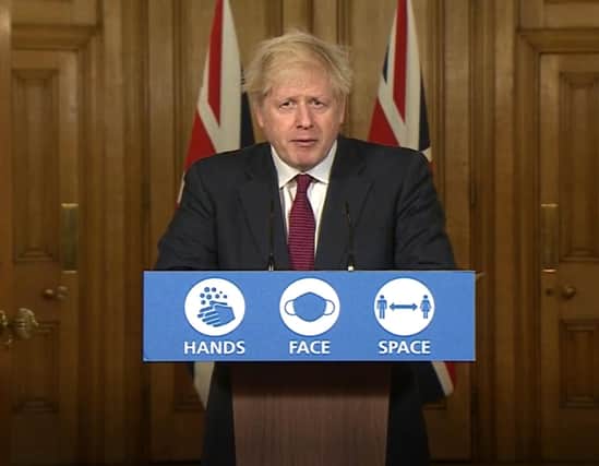 Screen grab of Prime Minister Boris Johnson during a media briefing in Downing Street, London, on coronavirus (COVID-19) and the introduction of Tier 4.