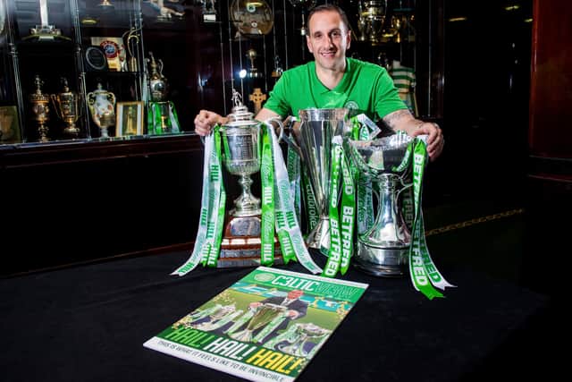 John Kennedy with Celtic's trophy haul from the first of their four straight seasons snaring all the Scottish honours. (Photo by Craig Williamson/SNS Group).