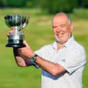 Erskine's Ronnie Clark shows off the trophy after his play-off win in the English Seniors' Stroke-Play Championship. Picture: England Golf.