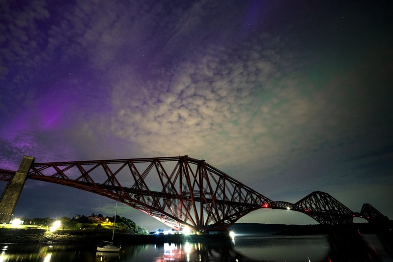 The aurora borealis, also known as the northern lights, above the Forth Bridge at North Queensferry.