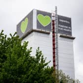 The covered structure of Grenfell Tower in London Photo by Leon Neal/Getty Images