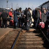 People queue to board a train back to Ukraine across the border from Hungary on March 12, 2022 in Zahony, Hungary. Picture: Christopher Furlong/Getty Images