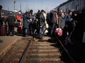People queue to board a train back to Ukraine across the border from Hungary on March 12, 2022 in Zahony, Hungary. Picture: Christopher Furlong/Getty Images