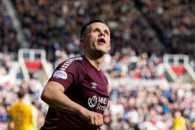 Hearts' Lawrence Shankland celebrates after Yutaro Oda scored to make it 2-2 against Livingston. (Photo by Mark Scates / SNS Group)