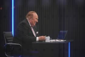 Presenter Andrew Neil prepares to broadcast from a studio during the launch event for new TV channel GB News.