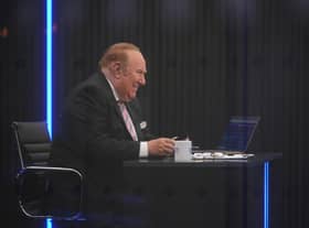 Presenter Andrew Neil prepares to broadcast from a studio during the launch event for new TV channel GB News.